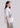 Blusa algodón tucanes bordados manga corta off white silueta lateral Psophía SS26