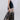 Side view of beige midi skirt showing fluid drape, elastic waist and refined baroque damask print