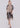 Front view of beige midi tunic with high neckline, button front and baroque damask print