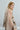 Side view of Psophía sleeveless tulle top highlighting the sculptural gathered shoulder and airy layers