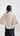 Back view of Psophía relaxed-fit bomber jacket showing clean lines, wide sleeves and urban style