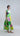 Front view of the Bloomlight bow midi dress with neck tie, sleeveless cut and softly gathered ruffle skirt.