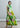 Editorial look of the Bloomlight bow midi dress SS26, sleeveless design with gathered ruffle skirt and light movement.