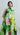 Psophía SS26 Bloomlight midi dress with neck tie, painterly floral print and fluid silhouette with an artistic feel.