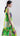 Opposite side view of the Bloomlight midi dress, highlighting the neck tie detail and lightweight recycled fabric.