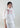 Front view of Camelia embroidered blouse with high mao collar, concealed button placket, and puff sleeves.