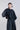 Front view of the lightweight jacket with zip closure, ring collar and softly gathered bishop sleeves
