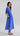 Side view of Lunar Breeze midi dress Psophía SS26 showing empire cut and fluid silhouette.