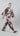 Side view of the relaxed silk palazzo pants highlighting fluid movement and soft drape of the stylized floral print.