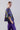 Side view of the Retro Prism blouse highlighting puff sleeves with adjustable ties and relaxed, airy volume.