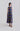 Front view of the Retro Prism sleeveless dress with round neckline, soft gathers and relaxed flowing silhouette.