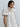 floral embroidered tie-sleeve blouse styled in an elegant contemporary look.