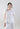 Front view of Camelia floral embroidered blouse with untied sleeves, showing a relaxed silhouette and refined texture.