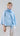 Front view of boxy cotton oxford shirt showing ruffled central opening and clean hip-length hem.