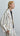 Inspirational look of double pinstripe cropped blazer styled with wide-leg trousers for a polished modern outfit.