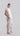 Side view of flowing embroidered Tencel pants showing their relaxed slouchy silhouette and natural movement.