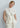 Main view of an embroidered Tencel ring-neck blouse with a fluid silhouette, airy volume and an elegant, contemporary feel.