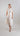 Front view of an embroidered Tencel shirt-inspired dress with a classic collar, hidden buttons and soft volume.