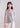 Flared sleeveless mercerized cotton T-shirt with relaxed A-line silhouette, soft drape, and modern casual elegance.
