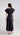 Back view of Psophía SS26 women’s flowy poplin maxi dress showcasing the relaxed fit and adjustable waist tie for a refined silhouette.
