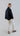 Back view of Psophía light jacquard relaxed straight pants with balanced proportions and modern style.