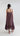 Back view of Psophía SS26 women’s flowy slip dress showcasing the clean back line, adjustable straps, and lightweight drape.