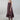 Psophía SS26 women’s Lunar Breeze flowy slip dress with micro polka dots, adjustable tie straps, and a fluid silhouette with volant hem.