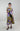 Side view of Orchid Canvas Button-Front Midi Dress showing fluid silhouette, short sleeves and satin cotton fabric with bold floral motif.
