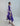 Side view detail of the Orient Contour silk midi tunic highlighting the mandarin tie-neck, fluid silk texture, and refined editorial finish.