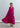 Rayon and silk halter maxi dress with asymmetric bell skirt, flowing silhouette and elegant minimalist design.