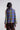Back view of Retro Prism Kimono Top showing fluid drape, wide sleeves and vibrant geometric pattern.
