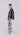 Opposite side view of relaxed blazer highlighting patch pockets, clean lines and relaxed fit