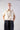 Front view of Psophía stretch piqué embroidered short-sleeve shirt with front pockets and relaxed silhouette.
