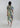 ack view of boat-neck dress showing flowing silhouette and Sun-Kissed Marigold Meadow print detailing.