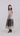 Side view of sleeveless A-line midi dress showing gathered waist and ornamental floral appliqué border